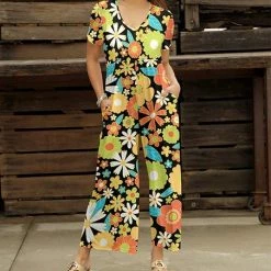 Hot Sale 😉 Bon Apple Tea Black & Green Floral V-Neck Empire-Waist Wide-Leg Jumpsuit - Plus ⌛