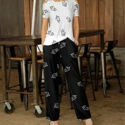 Buy ⌛ Bon Apple Tea White Leaf Sprig Cutout Top & Black Pocket Pants - 👩 Women 🔥